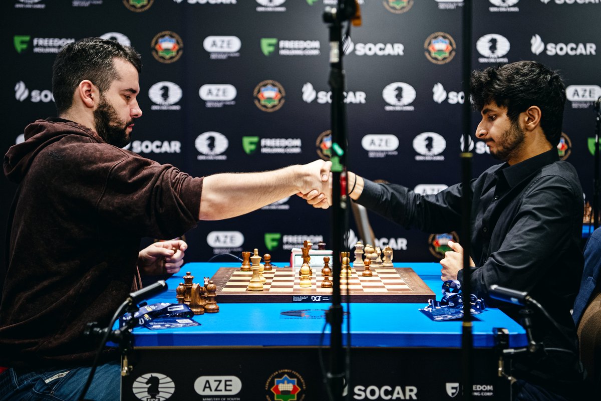 FIDE_chess's tweet photo. "Vidit Gujrathi won both games in the second tiebreak, securing the last free spot in the quarter-finals of the Open. Salimova, Goryachkina and Muzuchyk are through to the semi-finals of the Women's tournament." #FIDEWorldCup

Read all about yesterday's tiebreaks 👇 
https://t.co/c01vMFx4T5
📷 Stev Bonhage