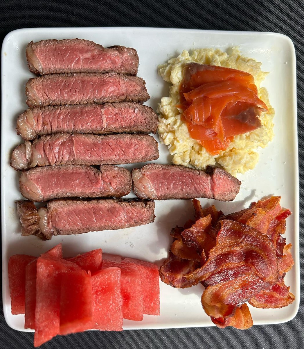 BBQlads's tweet photo. Something for everyone here! 😋
🥩
🥩
📷 @meatnfruit -sirloin 
-pasture raised bacon from @nikufarms 
-scrambled eggs with smoked salmon
-watermelon 
Cooked in grass fed butter, seasoned with sea salt. 
🥩
🥩
#animalbased #animalbased30 #animalbaseddiet #steakandeggs https://t.co/qH9eaHpSv2