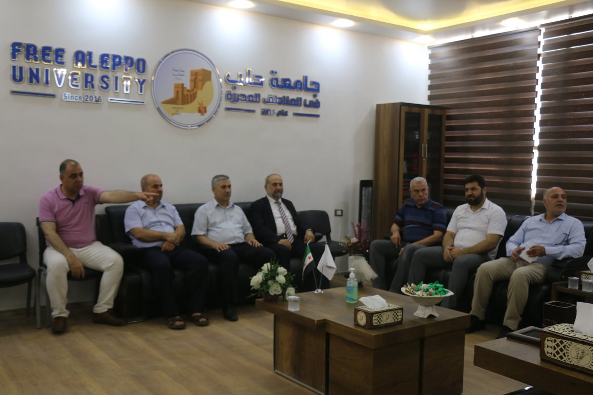 SyrianCoalition's tweet photo. رئيس الائتلاف الوطني: في جولتنا الميدانية للمناطق المحررة، التقينا برئيس جامعة حلب الحرة والكادر التدريسي والإداري فيها. https://t.co/2Elg9mYllu