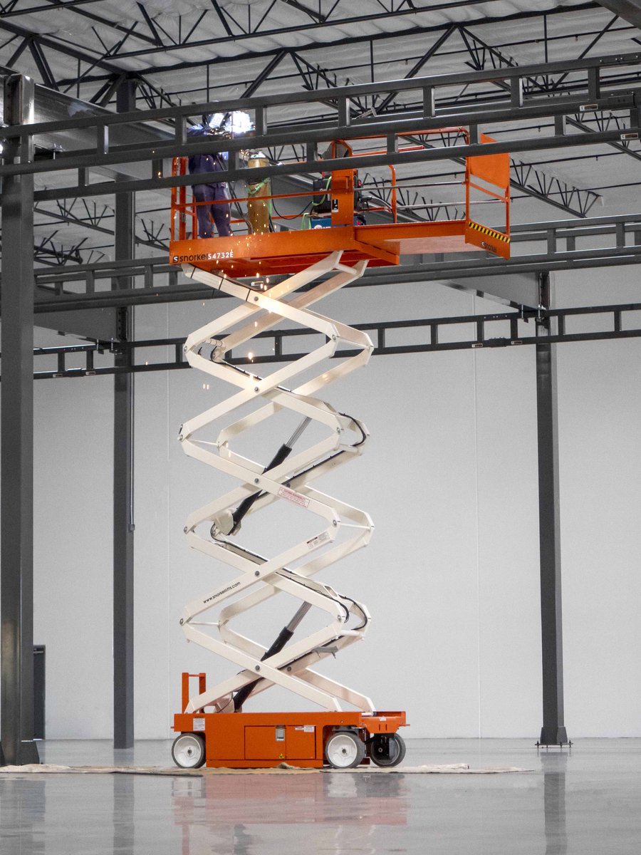 AhernIreland's tweet photo. With a working height of 11.8m, the Snorkel S4732E is one of the tallest scissor lifts in Snorkel’s lineup. This electric scissor lift boasts a number of innovative features, including deep cycle batteries and a platform overload system. @snorkellifts https://t.co/VMAWxgBzAx