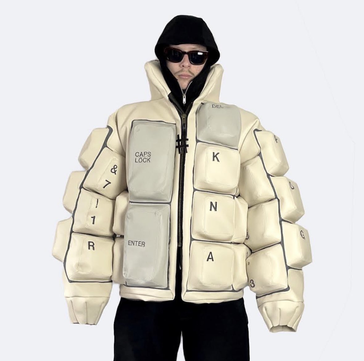 designdocument's tweet photo. Keyboard Puffer Jacket by Liminal Workshop ⌨️ https://t.co/NZE63nqU4z