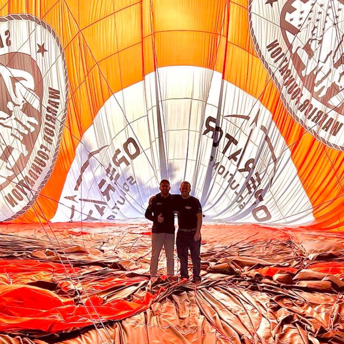 RescueSpace's tweet photo. Operator Solutions CEO, CMSgt. Brandon Daugherty, and Balloon Pilot, Shane Wallace, recently embarked on an incredible journey to witness the completion of the awe-inspiring #Alpha5Project hot air balloon at Cameron Balloons in Dexter, Michigan. (1/4) https://t.co/xwZLgB4wyn