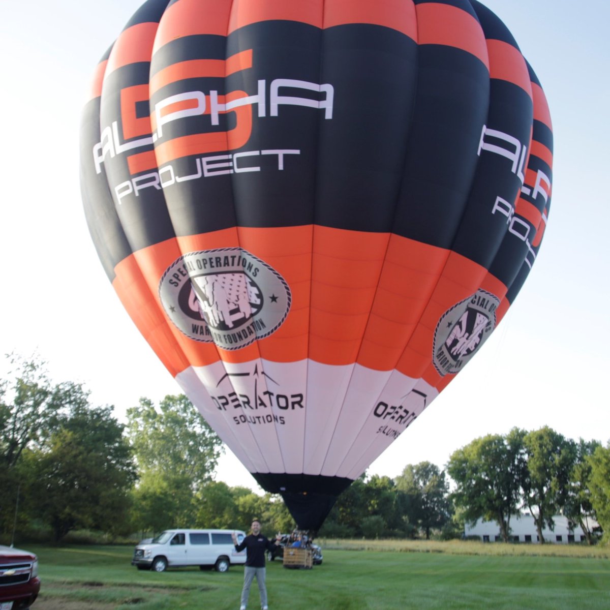 RescueSpace's tweet photo. Operator Solutions CEO, CMSgt. Brandon Daugherty, and Balloon Pilot, Shane Wallace, recently embarked on an incredible journey to witness the completion of the awe-inspiring #Alpha5Project hot air balloon at Cameron Balloons in Dexter, Michigan. (1/4) https://t.co/xwZLgB4wyn
