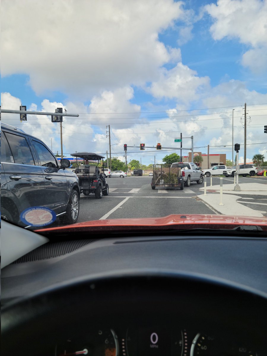 dgr1968's tweet photo. @CityNPR so much for signs telling people to cross 19 in their golf carts at Gulf Dr. Sitting at main and 19. Someday someone is going to get seriously hurt. Then what? This is stupid. https://t.co/N4cVSGL5gz