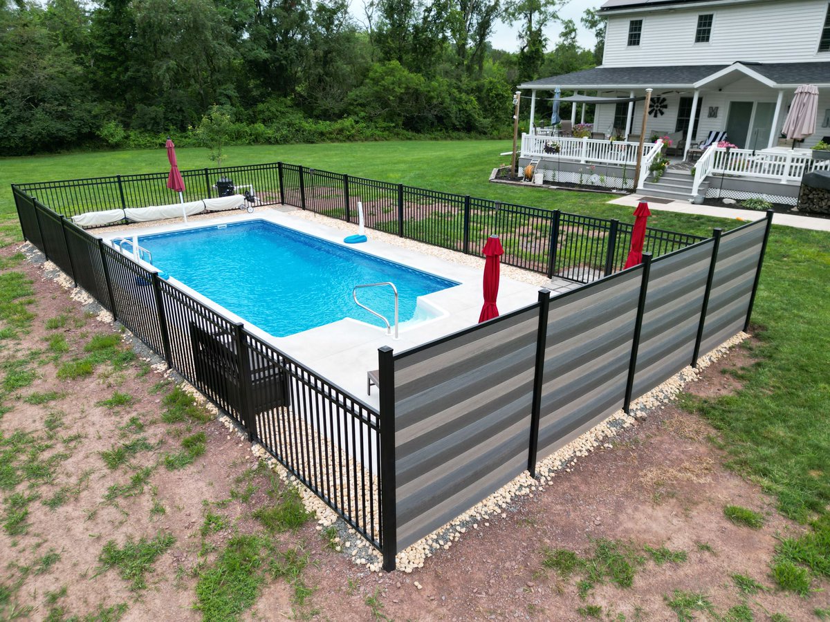 Key-Link's aluminum fence provides both safety and classic style to this pool! Thanks to Upper Dauphin Vinyl Products for the photos of their installation.
