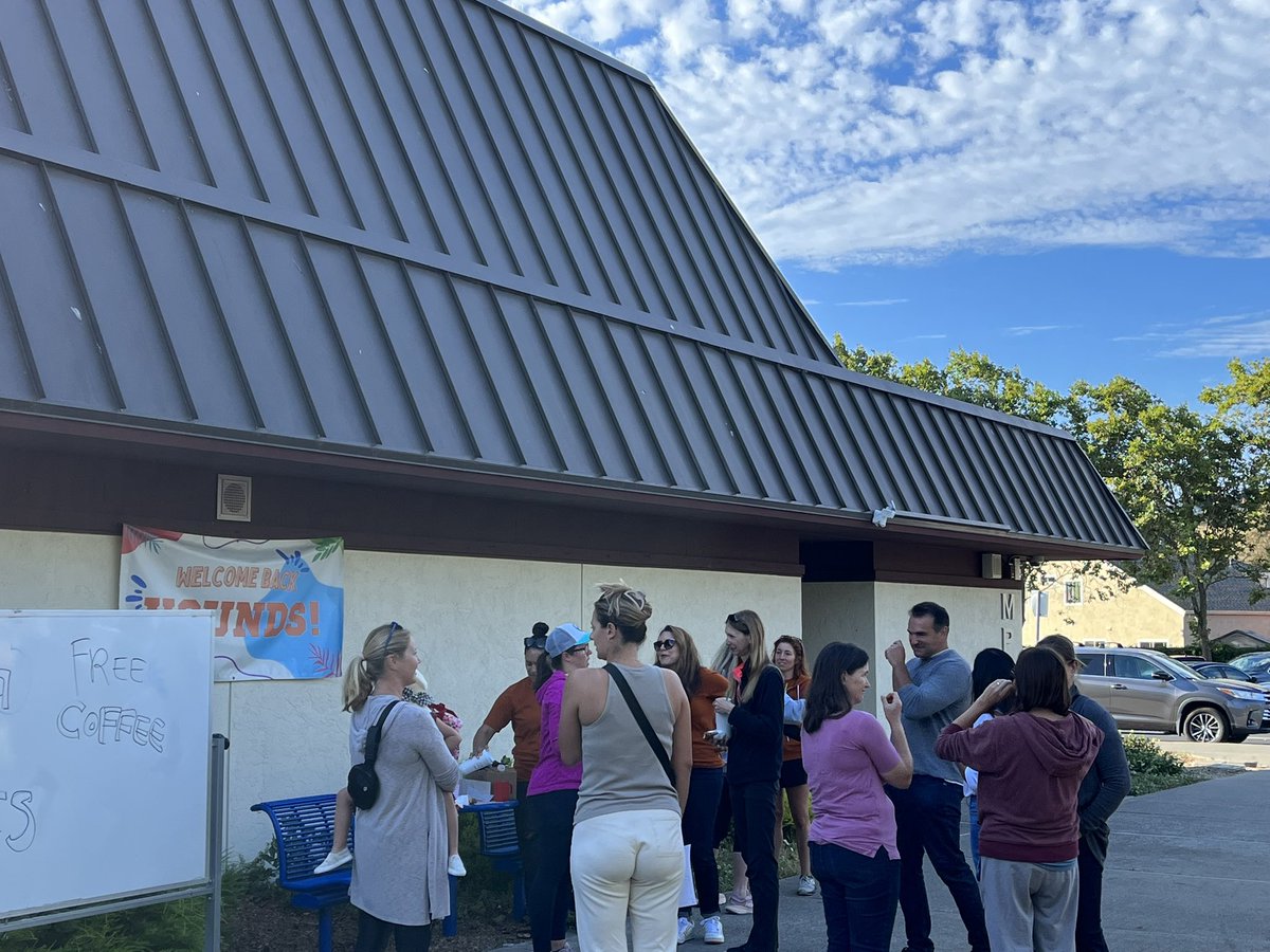 Eager <a href="/HendersonHounds/">Joe Henderson Elementary</a> 🐾 up bright and early on the #FirstDayOfSchool as our supremely supportive PTG greets and caffeinates ☕️ our adult Hounds! We’re off to a great start for a stellar 23-24 school year at Joe Henderson! 🧡