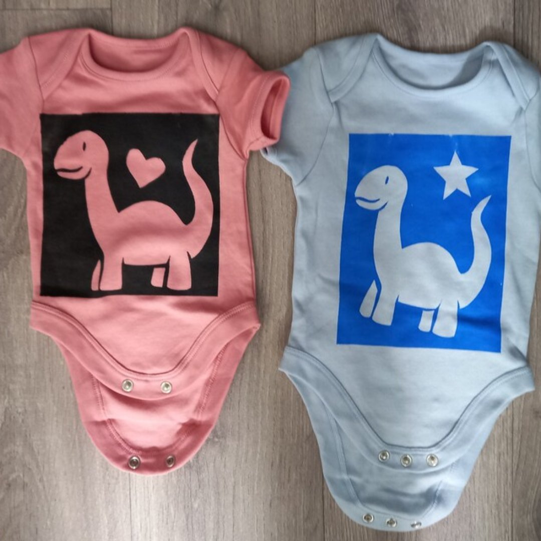 Adorable baby onesies with cute handprinted dinosaurs are available in my Etsy store! axelinaproductions.etsy.com #dinosaur #baby #craftblogclub #babyfashion #babyshower #kawaii #cute #inbizhour #USAbizparty #babyonesies #socialmumshour #ukmakers #ukgiftam #craftbizparty #yourbizhour