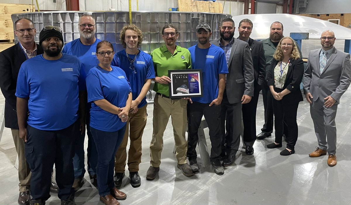 spacecitychick's tweet photo. Visiting @NASA_Orion & @NASA_SLS suppliers in #Indiana this week such as Imagineering Finishing Technologies who contributed to the success of the Artemis I mission to the #Moon. Thanks to this hard-working team, pictured here by the #Artemis V Orion crew module barrel. #LMSpace https://t.co/BNgtHIVjqF