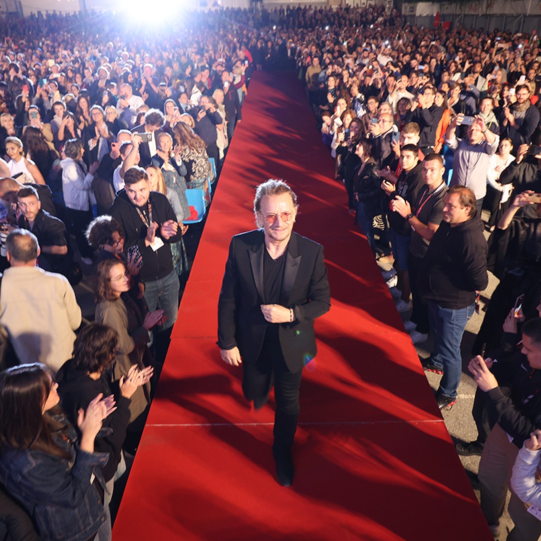 U2's tweet image. 'Kiss the Future' premiere. Sarajevo Film Festival. Thanks for having us.