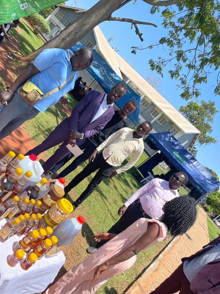 22ndGUGuild's tweet photo. H.E @FrancisOk0t1 with his team interacting  with one of our partners in this years' edition of the Guild Buzzar @CentenaryBank . Thank you @CentenaryBank for the tremendous work. @odida_jackson https://t.co/JbecOK3D71