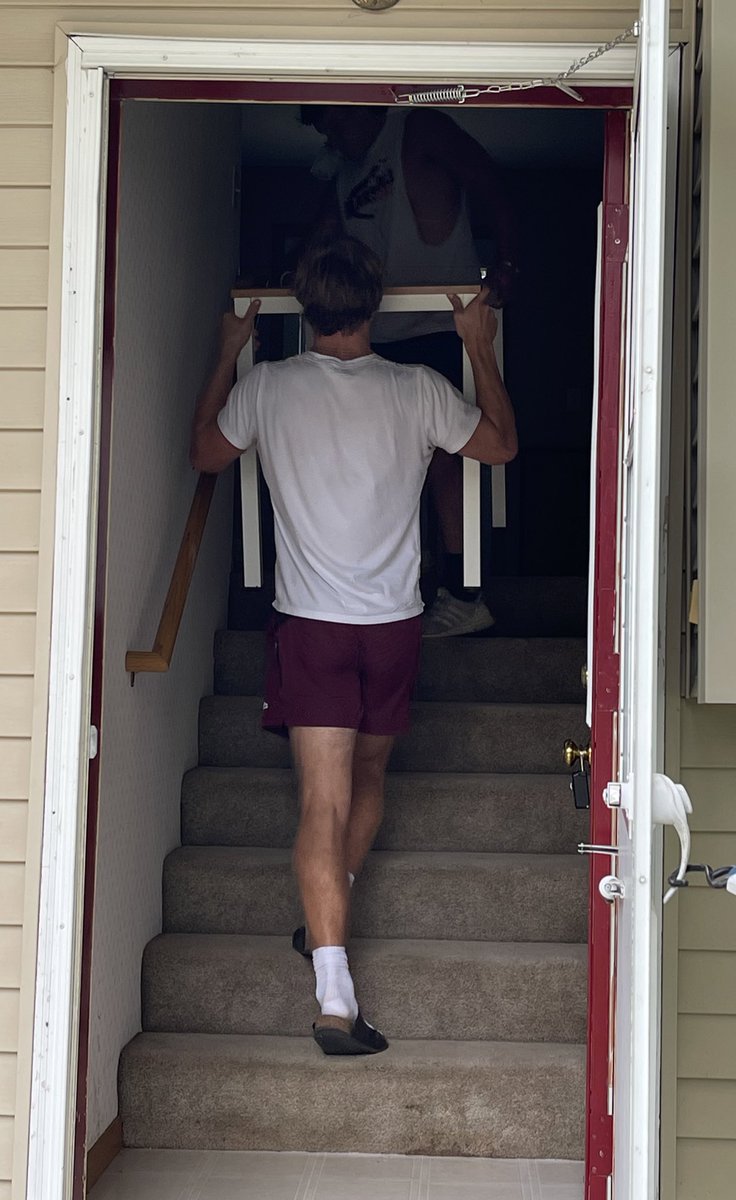 Tigers helping a new family move to Marshall