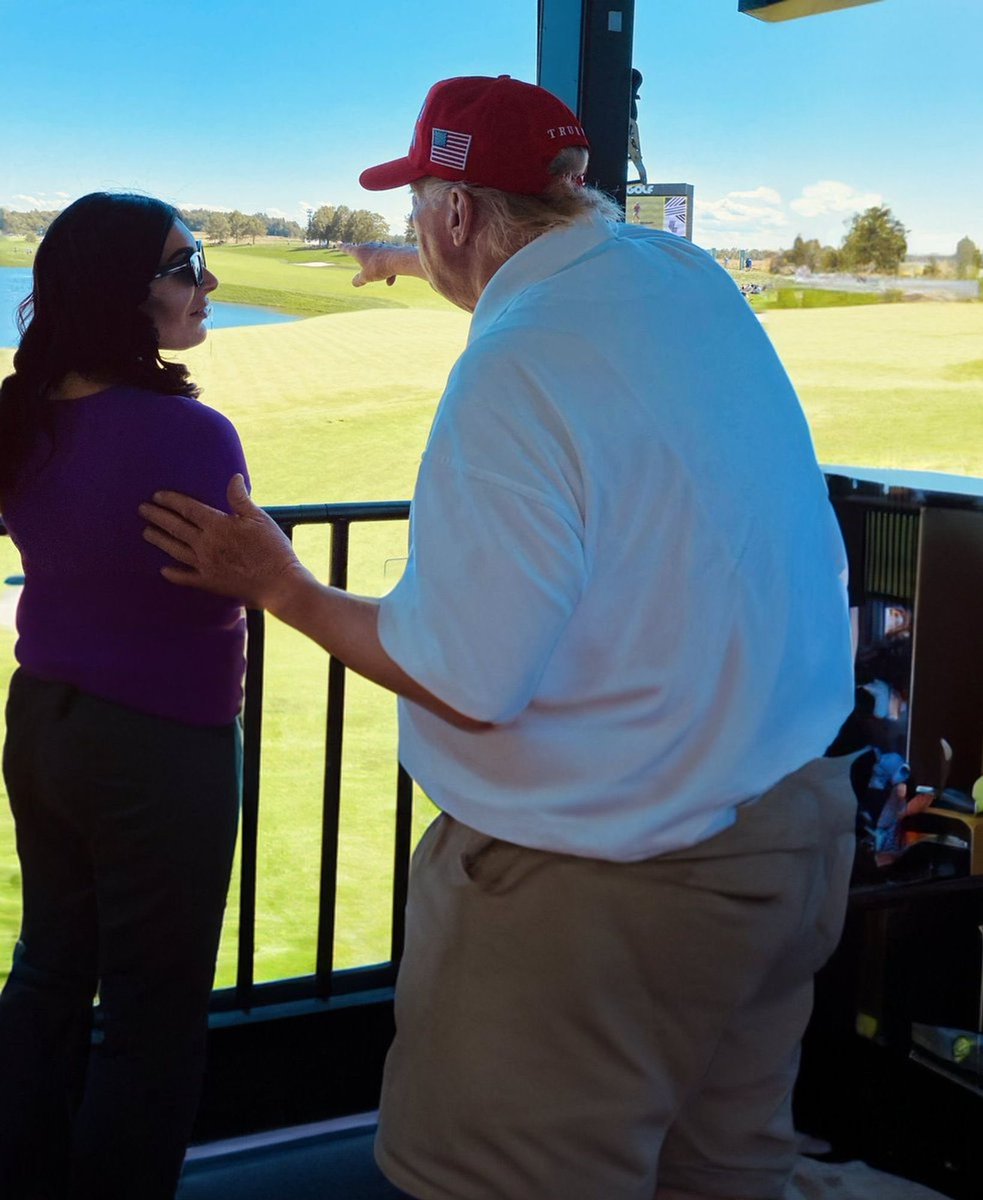 Trump looks like he’s giving Laura Loomer a side quest to rescue his frog son from the pond.