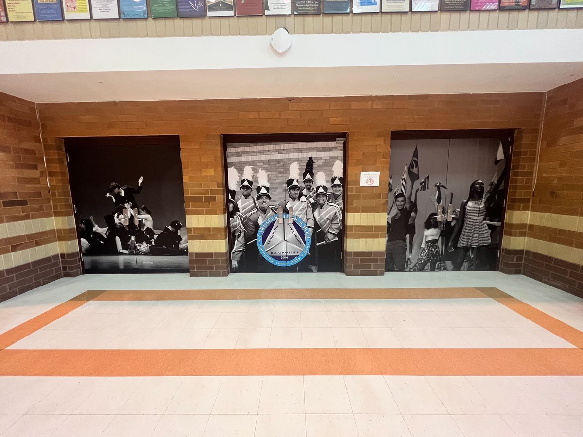 The new door wraps for the CHS auditorium look 🔥. Displaying the OUTSTANDING level of C’BURG music and performing arts. #CoyotePride 🐺