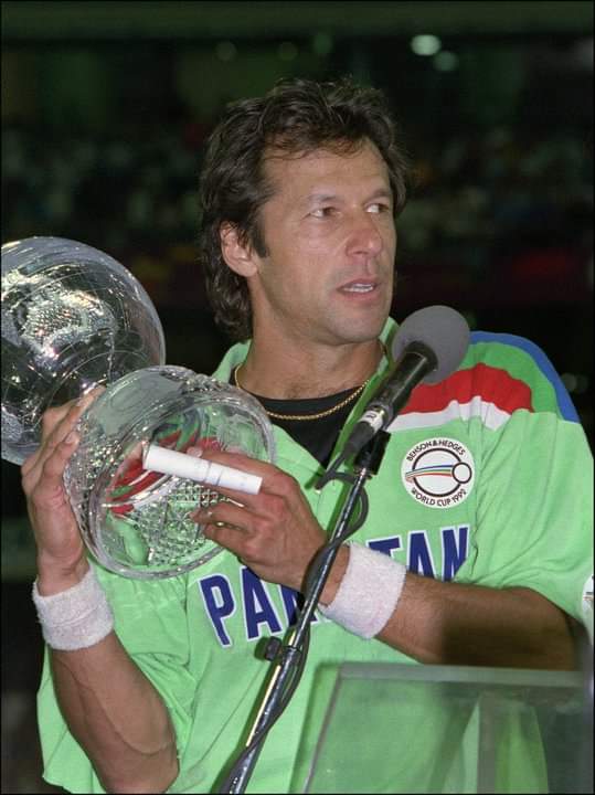 Imran Khan, captain of Pakistan holds the ICC Cricket World Cup 1992 trophy aloft after beating England in the final at Melbourne.