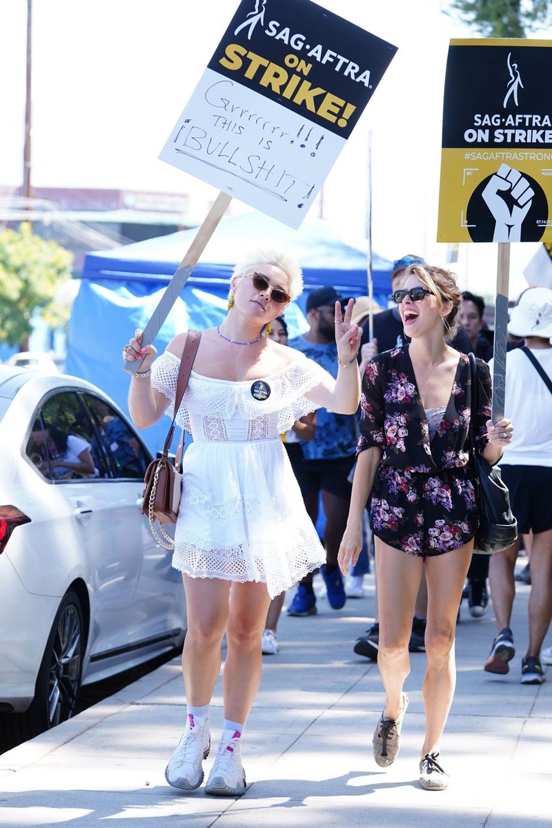 bestofpugh's tweet photo. Florence Pugh on the picket line in support of the SAG-AFTRA and WGA strike. https://t.co/SOPyR4sCUs