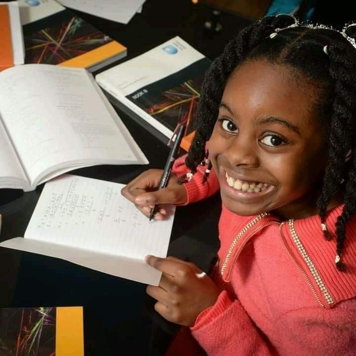 At age 15, Nigerian Math Genius, Esther Okade started bagging her PhD in Financial Mathematics.

She entered the Open University in the UK at the age of 10 in 2015.

At age 6, she passed GCSE exams usually taken by 14-16 year olds in the UK.

She wrote math workbooks at age 10.