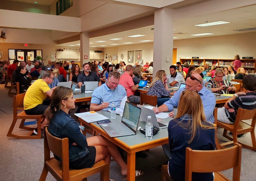 TriadHighSchool's tweet photo. The THS faculty gathered in the library to prepare for the new school year. They are excited to meet all their new students on the first day of school tomorrow!
#triadproud #triadtogether 
#backtoschooltime 📚 https://t.co/q5h4rTbCXH