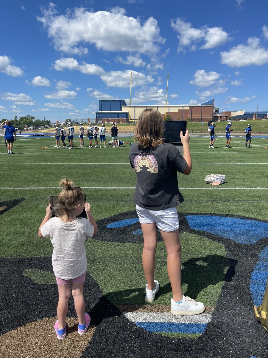 CoachBradClark's tweet photo. Called in the special assistants for scrimmage week this week! #Blessed to have both of my daughters at practice today! Football is family! https://t.co/PEnQkhtTSb