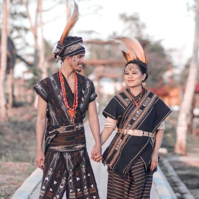 The traditional clothes of the Tanimbar ethnic - Maluku Indonesia.  The Men cover  heads and open their ears.