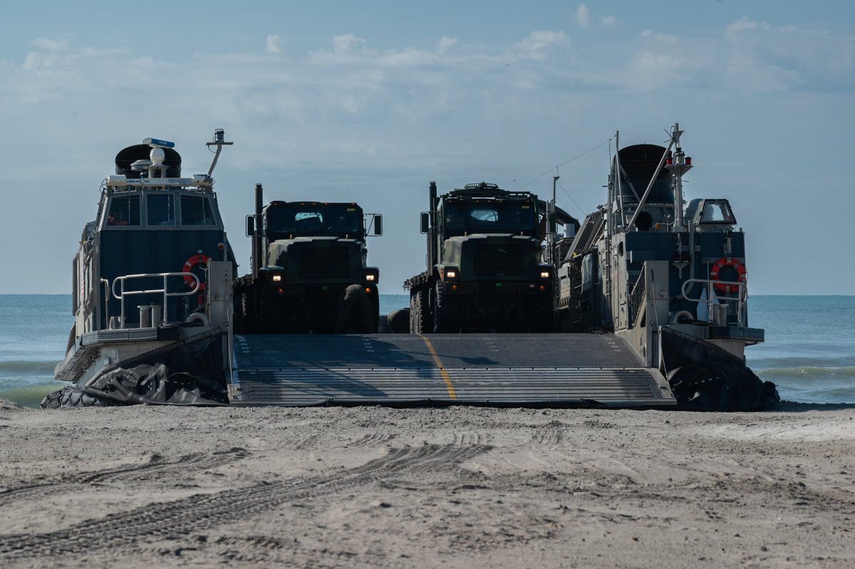 USMC's tweet image. #Seabees with the @USNavy Expeditionary Combat Command arrive at Onslow Beach via Landing Craft Air Cushion on @camp_lejeune during Large-Scale Exercise 2023 (LSE 2023), Aug. 9. 

LSE 2023 highlights the #Navy and #MarineCorps' ability to employ lethal force globally.

#USMC