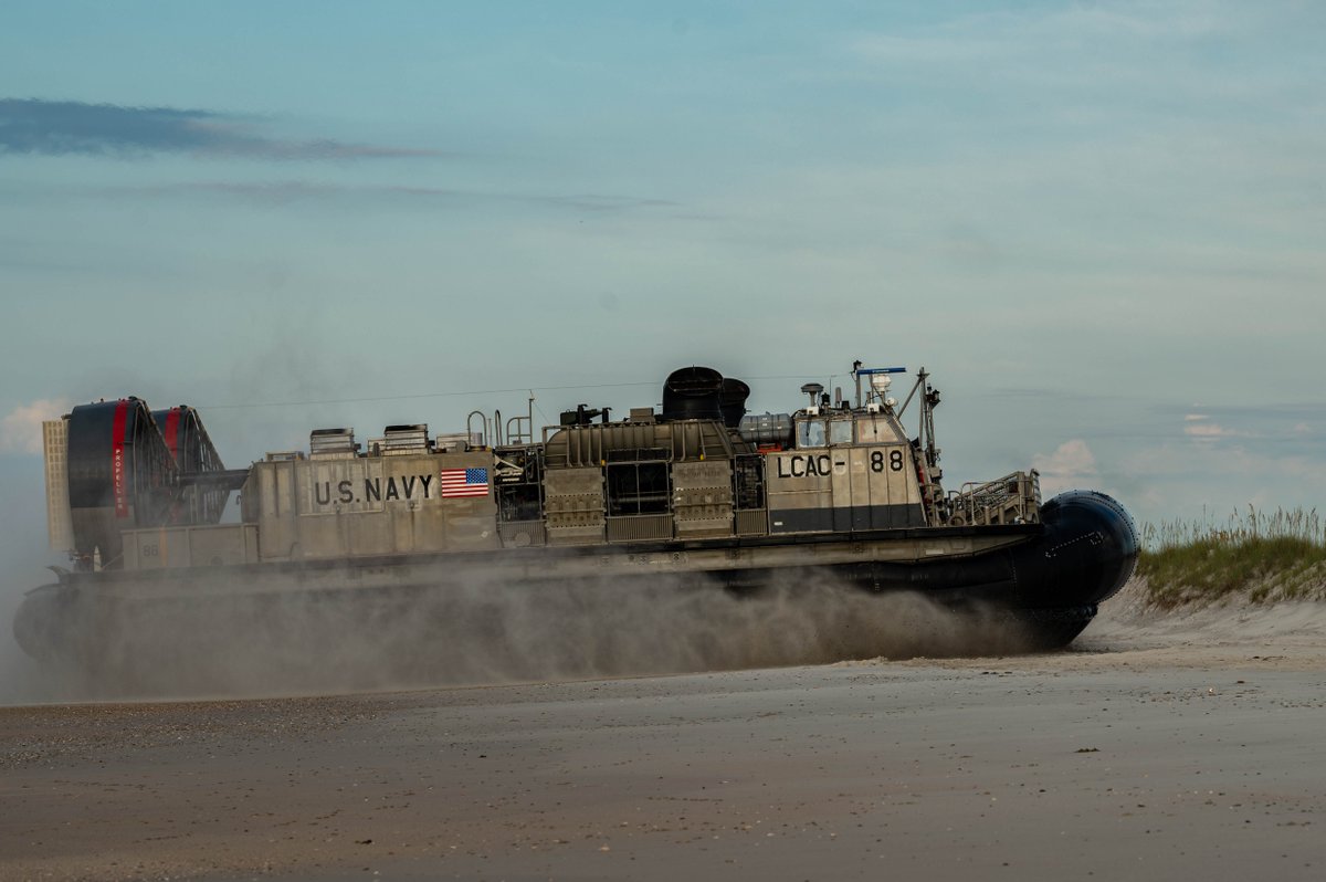 USMC's tweet image. #Seabees with the @USNavy Expeditionary Combat Command arrive at Onslow Beach via Landing Craft Air Cushion on @camp_lejeune during Large-Scale Exercise 2023 (LSE 2023), Aug. 9. 

LSE 2023 highlights the #Navy and #MarineCorps' ability to employ lethal force globally.

#USMC