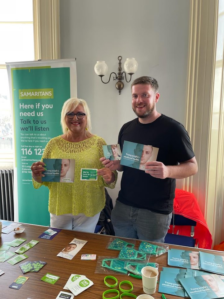 Claire and Colin pictured recently at Causeway Pride Wellbeing Event in Portrush Town Hall. Here if you Need us- Call free on 116 123 Email jo@samaritans.org We also have a self help app -selfhelp.samaritans.org