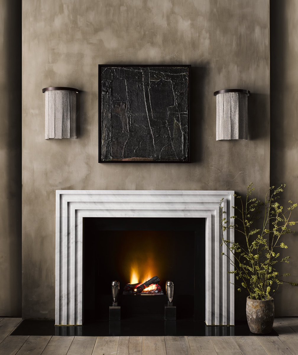Our Rubicon fireplace surround is a strikingly contemporary design featuring a series of geometric ovoid flutes giving the surround a strong three-dimensional presence achieved by juxtaposing light and shade. The simplicity of the piece makes it fit into interiors of all styles.