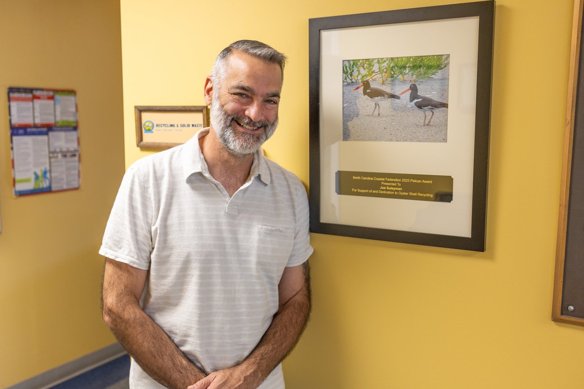 NewHanoverCo's tweet photo. Congratulations to Joe Suleyman, #NHCgov Recycling &amp; Solid Waste Director, for receiving the Pelican Award from the @NCCoastalFed, highlighting his ongoing commitment to environmental stewardship. Learn more about Joe and his work to #KeepNHCgreen: https://t.co/EIH3Ny8WvA https://t.co/yM25YdAOwJ