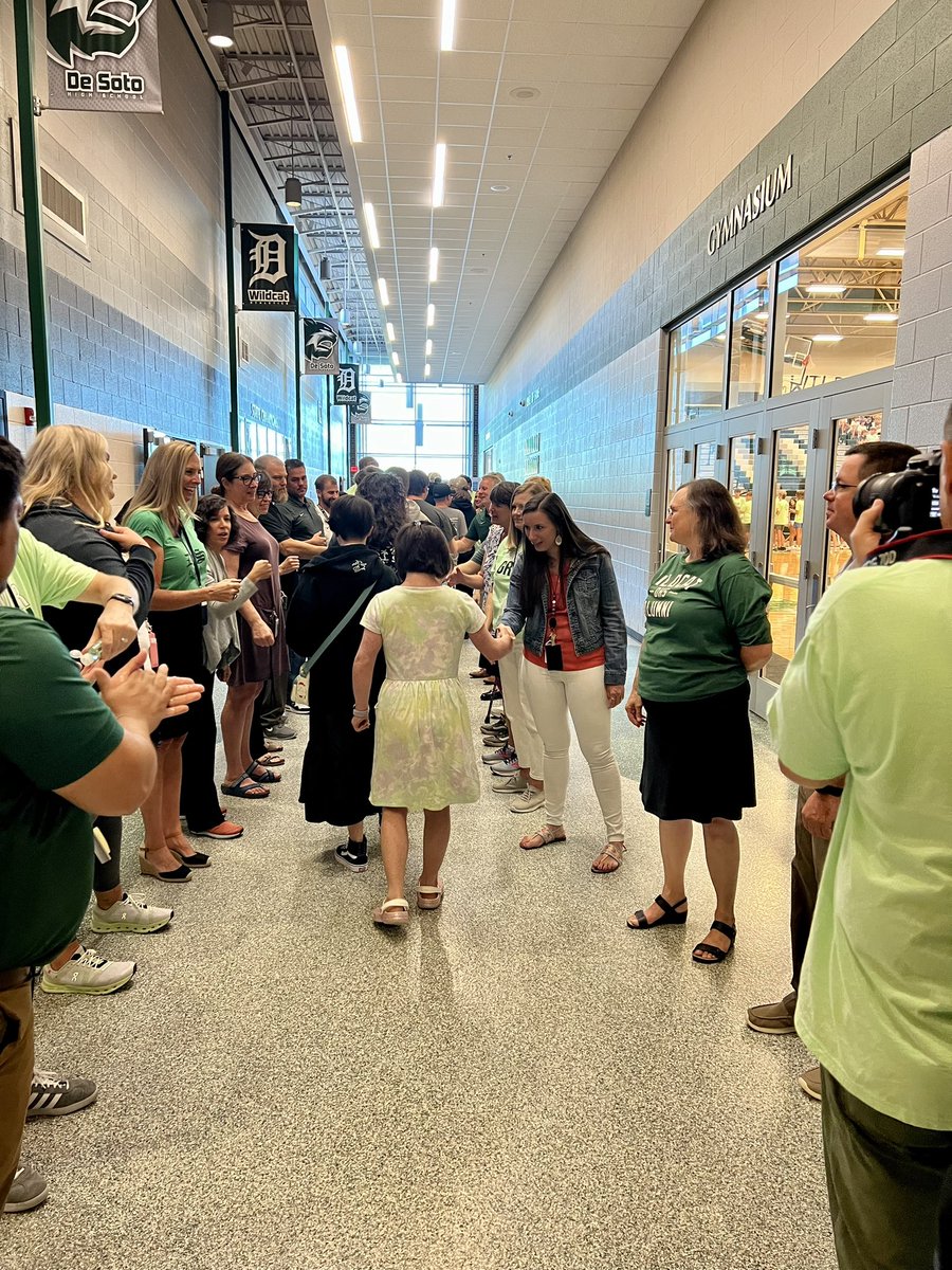 swartz_c's tweet photo. Amazing welcoming culture at DHS!  So fun to participate in the epic “gauntlet” and shake hands with each freshman student today!  What a wonderful experience! @USD_232 @DeSotoWildcats https://t.co/pNAWXvbVE2