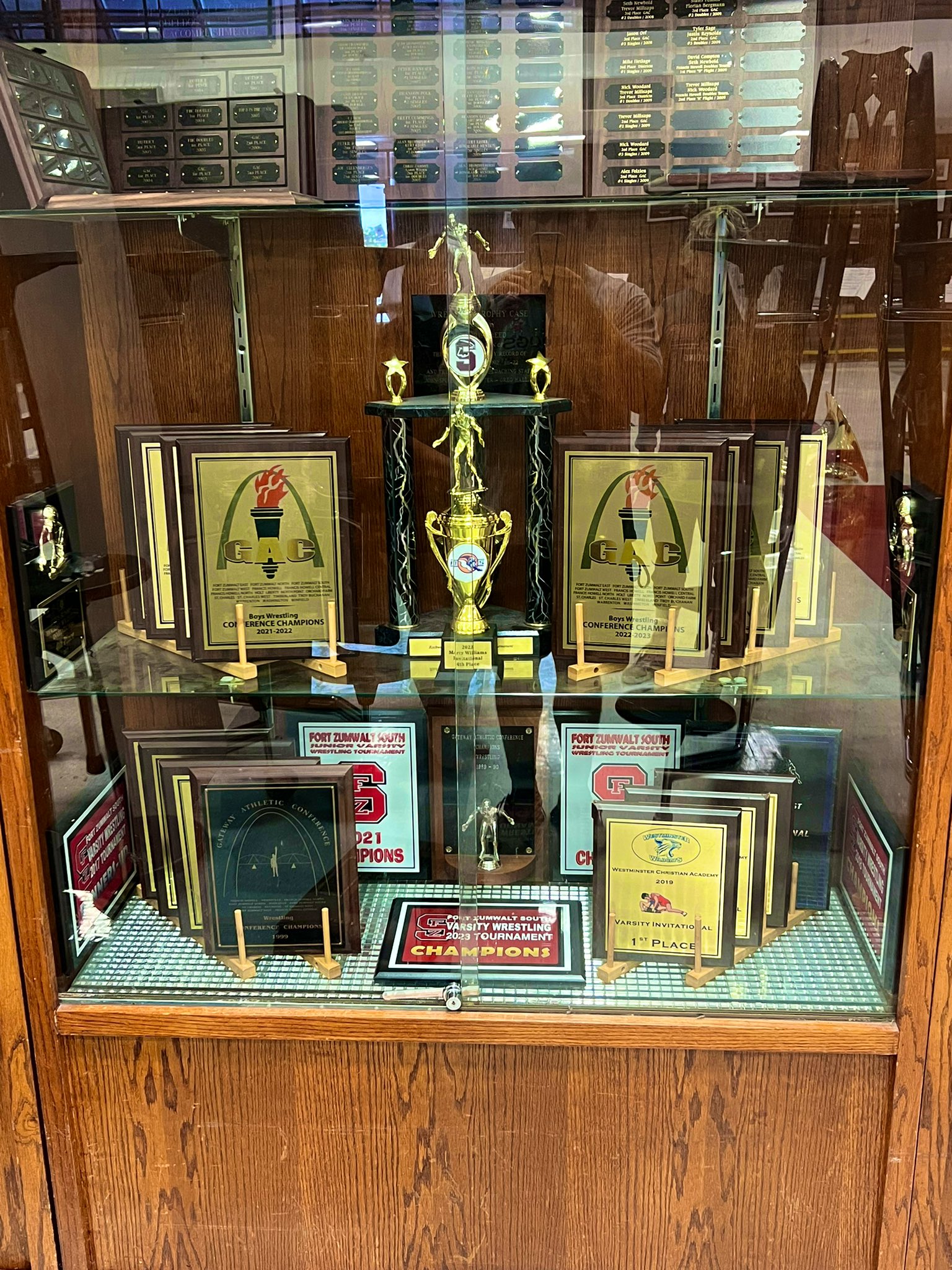 FZSwrestling on X: Wrestling portion of the trophy case in the commons got  a makeover as we kick off the school year with our recent tournament  trophies & GAC titles. District trophies