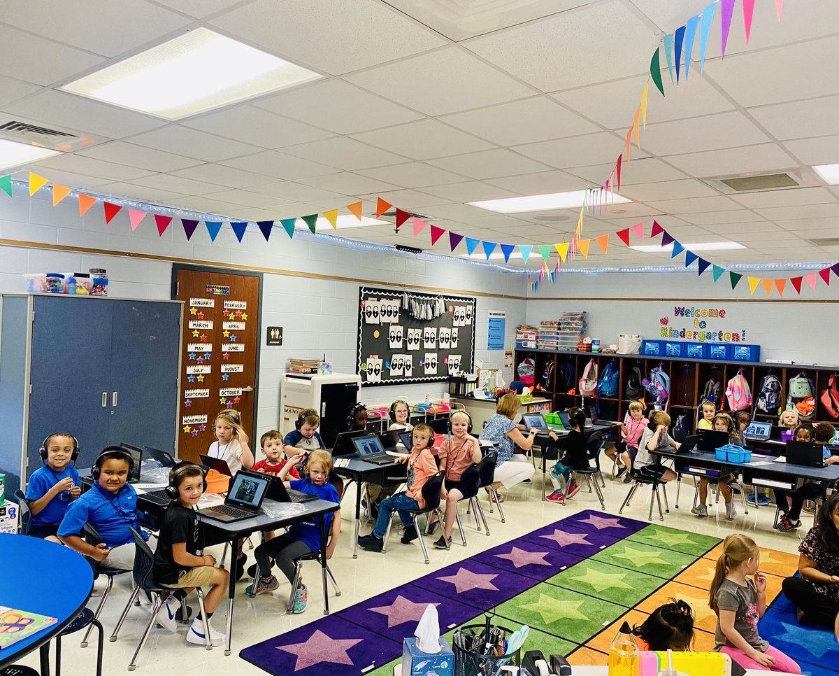 tayloragnewK's tweet photo. We are rocking and rolling in Kindergarten this week! Students practiced talking with their “elbow partner” during our math discussion. We also had the chance to explore on our Chromebooks for the first time! 
❤️💻📚 #AESpride https://t.co/XkusOrhe1p
