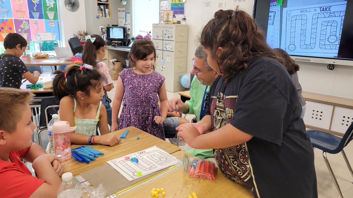 ErinAlexanderF2's tweet photo. When we are learning math games and @greg_machi walks in... Rockstar status!! @AnneEMoncureES @ThomasTaylorEdD https://t.co/D3rnmTakvz