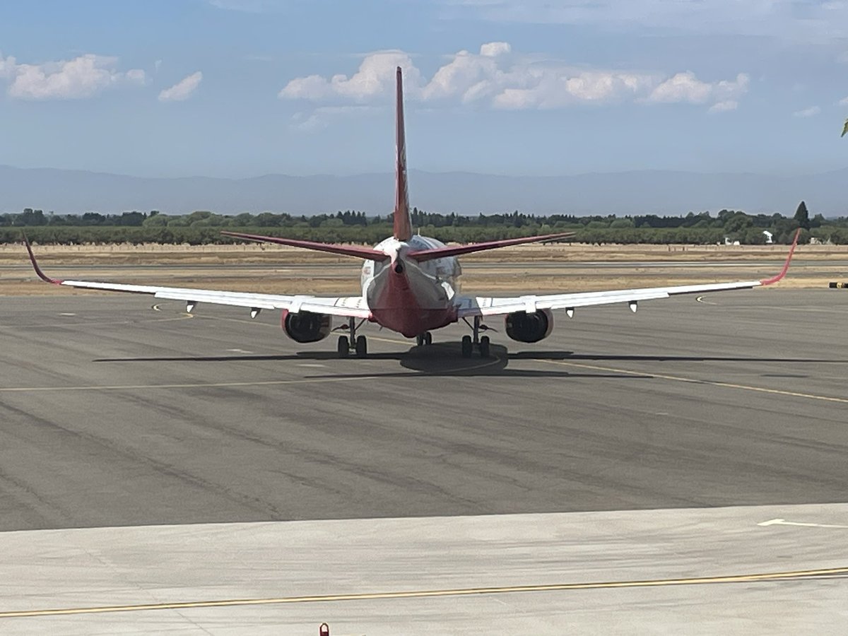 CALFIRE_ButteCo's tweet image. The Chico Air Attack Base is supporting ground crews fighting the #Slide1 fire in the Mendocino National Forest. Four Type I air tankers currently reloading here between retardant drops.