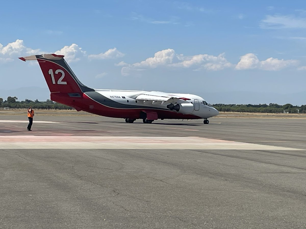 CALFIRE_ButteCo's tweet image. The Chico Air Attack Base is supporting ground crews fighting the #Slide1 fire in the Mendocino National Forest. Four Type I air tankers currently reloading here between retardant drops.
