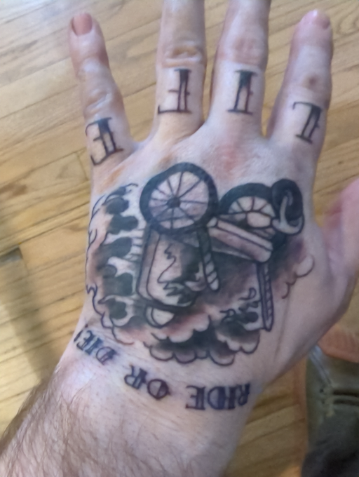 derek_Sanchez's tweet photo. @alexisohanian @alexisohanian Check this out! @GRIT_Freedom is building an adaptive fitness brand helping people with disabilities live active lives. One of our riders tattooed our chair on his hand! https://t.co/PDFsA5jTNF