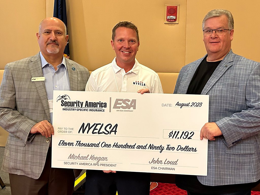 Security America Writes Check for $11,192 to New York Association!

NYELSA President, Tom Powers, accepts check from ESA CEO, Merlin Guilbeau and incoming Chairman, Kevin Stone, for Security America Insurance program participation.