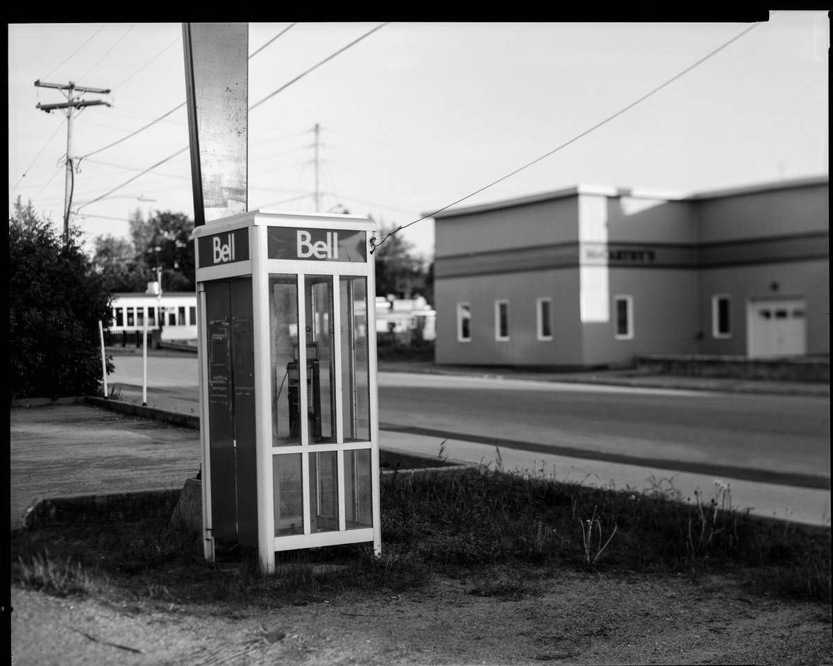 Ian Austen (@ianrausten) on Twitter photo 2023-08-16 21:57:50 This payphone booth shares its patch outside of the Liquor Control Board of Ontario store in Killaloe with a weed lot. Killaloe was a destination for draft dodgers during the war in Vietnam. (Shen Hao FCL-810 AC, 14in f6.3 Kodak Commercial Ektar, @KodakProFilmBiz TXP 320) This payphone booth shares its patch outside of the Liquor Control Board of Ontario store in Killaloe with a weed lot. Killaloe was a destination for draft dodgers during the war in Vietnam. (Shen Hao FCL-810 AC, 14in f6.3 Kodak Commercial Ektar, @KodakProFilmBiz TXP 320)