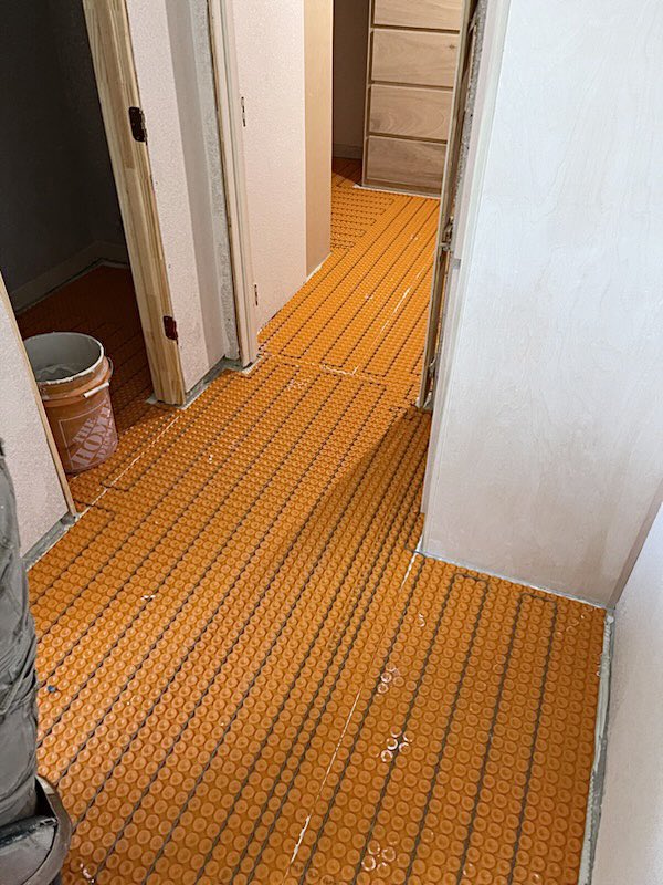 gabi_sperry's tweet image. It’s Heated Floor System installation day in McKinney! Cold weather will be here before we know it &amp;amp; my clients are excited to walk around barefoot on warm porcelain tile floors in their Master Bathroom &amp;amp; Closets #DFWI #HeatedFloors #ResidentialDesigner