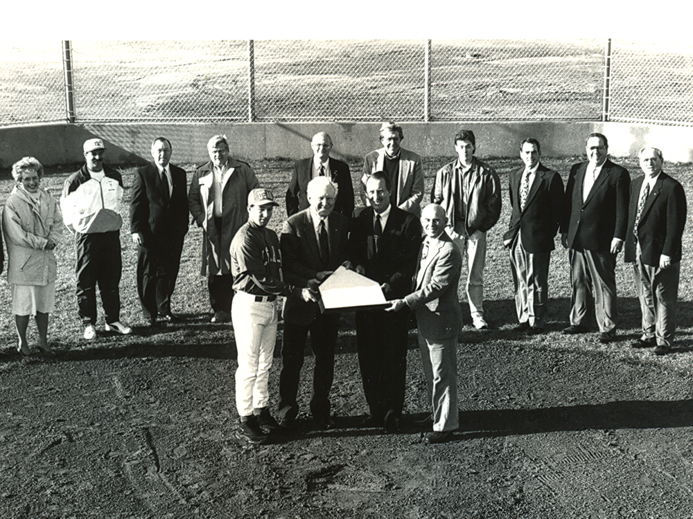usaodrovers's tweet photo. Folks gather around to celebrate the installation of home plate at the Bill Smith Ballpark baseball field. Do you see any familiar faces? ๐
#ThrowbackThursday #Drover50th ๐ค #DroverNation https://t.co/VK0rM6jjCd