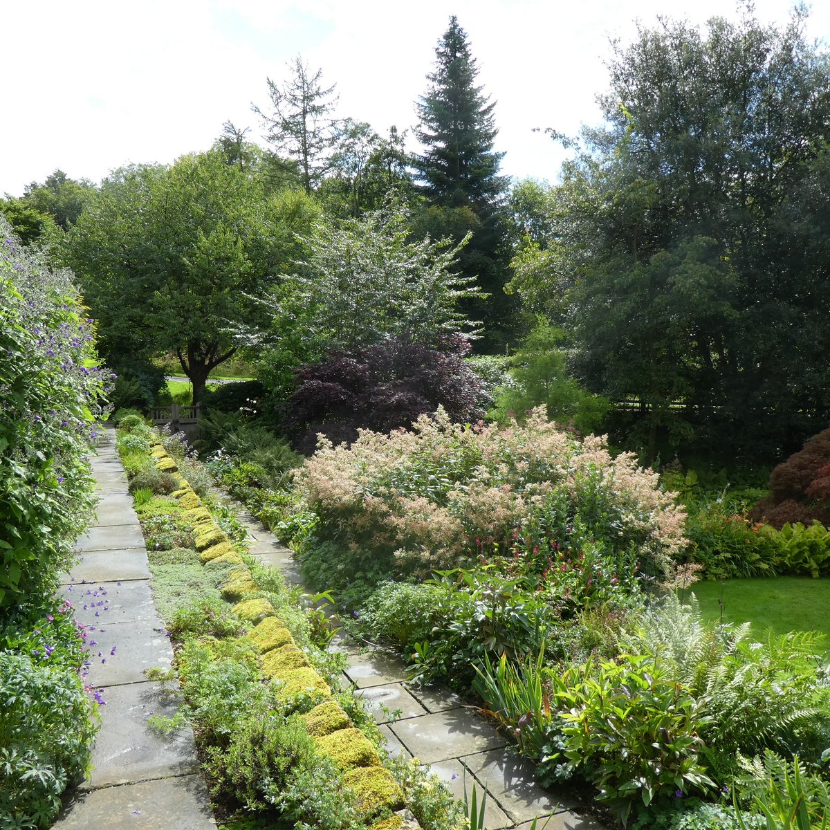 SLGardens's tweet photo. A wet visit to #MountGrace Priory, the rebuilt monk's cell, good information in the house about Carthusians but worth going for the interestingly planted garden by Chris Beardshaw; I love it, and I don't say that often! https://t.co/cMov3u9p4T