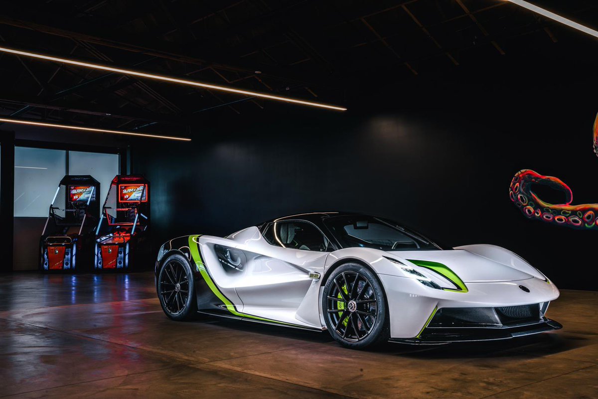 JensonButton's tweet photo. Here she is! Proud to show off my @lotuscars Evija which I think looks stunning😍 if you are at Quail tomorrow you’ll be able to see her on the Lotus stand along with some other beautiful cars. 

What do you think of the Brawn inspired paint scheme? 

#lotus #evija #ev #hypercar #brawn #quail #car