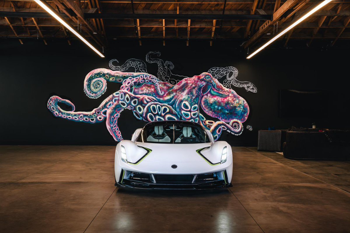 JensonButton's tweet photo. Here she is! Proud to show off my @lotuscars Evija which I think looks stunning😍 if you are at Quail tomorrow you’ll be able to see her on the Lotus stand along with some other beautiful cars. 

What do you think of the Brawn inspired paint scheme? 

#lotus #evija #ev #hypercar #brawn #quail #car