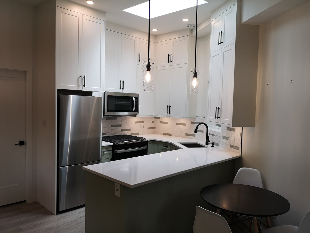 BackyardBungalo's tweet photo. Backyard Bungalows 700 Sq Ft Garden Suite (aka laneway house, carriage house, tiny home, etc.)! 9 and 10 ft ceilings, 1 bed and den, 1 bath, quartz countertops, heat pump, fireplace, and more. See video on YouTube https://t.co/FZcuMa7nYO https://t.co/EfASIMmHE1