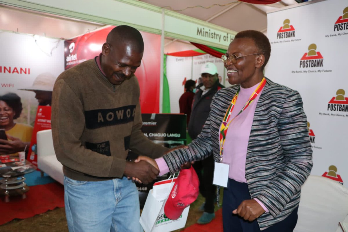 Postbank1's tweet image. Postbank Chairperson, Amb. Sarah Serem  interacts with Customers who visited our stand during the ongoing #DEVCON2023. The bank  partners with different stakeholders in advancing the Devolution agenda on financial inclusion in all counties. #DevolutionConference2023  #devcon