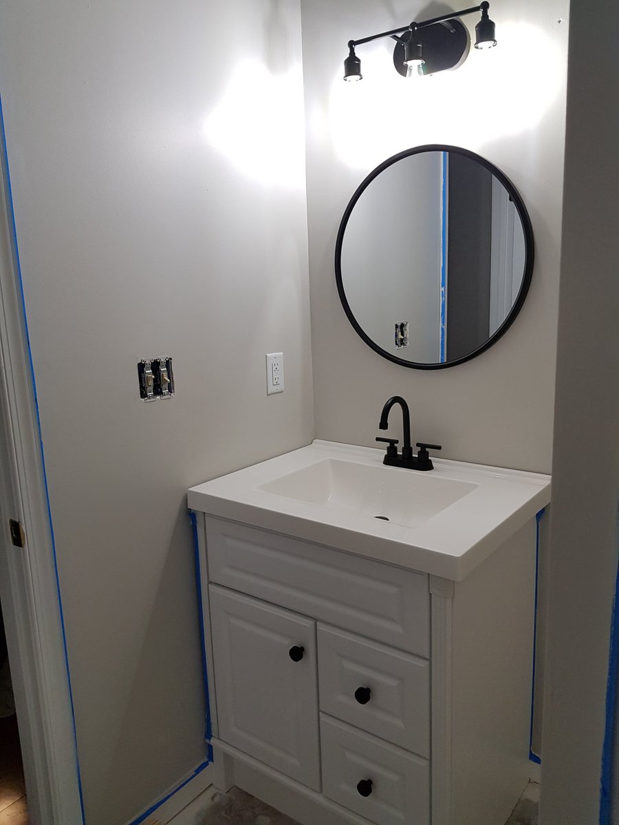 2 bathrooms in our new house were seriously outdated and needed a refresh.

Kids have been out of town visiting grandparents and come home this weekend.

Been working furiously to get them finished before they return.

Almost done.

Here's a sneak peek of the before and after.