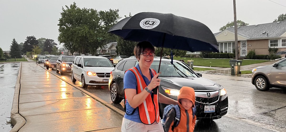 First day of school rain! Yikes… The new District 63 umbrellas came in very handy this morning.