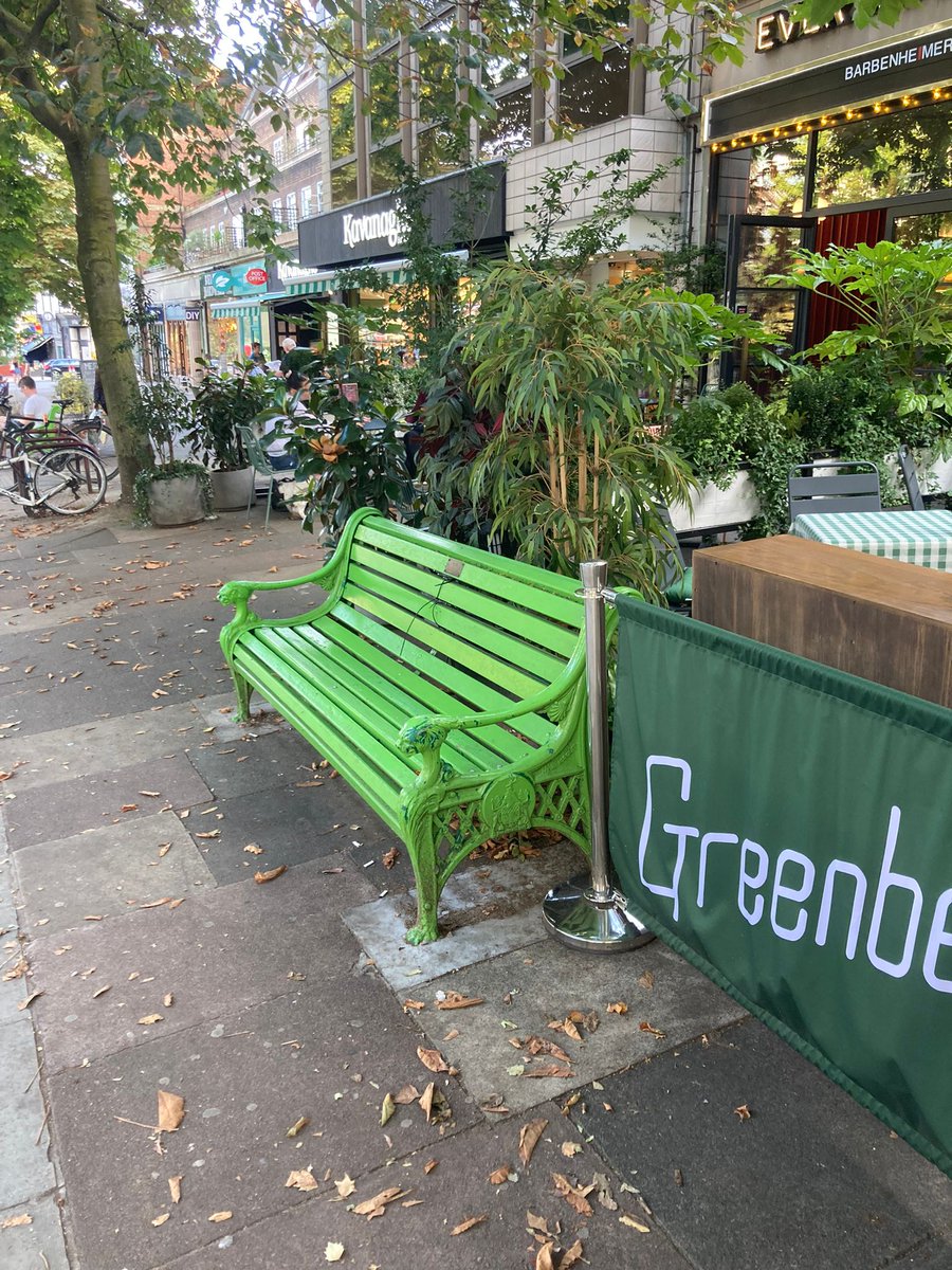 BenSalamon1's tweet photo. Found another... well four actually! On either side of the two green benches on Haverstock Hill, outside Greenberry Hill and Kavanagh's. The wood appears more modern, but how old are these metal sides to the benches? #BelsizePark #hiddenhistory https://t.co/qWfXeJybWR