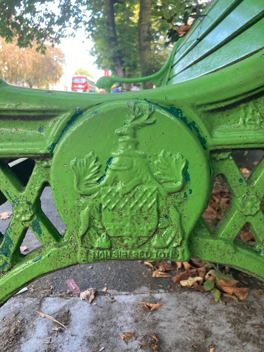 BenSalamon1's tweet photo. Found another... well four actually! On either side of the two green benches on Haverstock Hill, outside Greenberry Hill and Kavanagh's. The wood appears more modern, but how old are these metal sides to the benches? #BelsizePark #hiddenhistory https://t.co/qWfXeJybWR