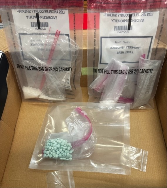 CVLASD's tweet photo. Our Summer Crime Enforcement Program Deputies were busy this week. They assisted on 3 search warrants, made 9 narcotic arrests, and wrote 23 citations. Some of the items siezed were marijuana and mushrooms. Further, they found a firearm and hollow point ammunition. #LASD https://t.co/BHvVAj8Q9R