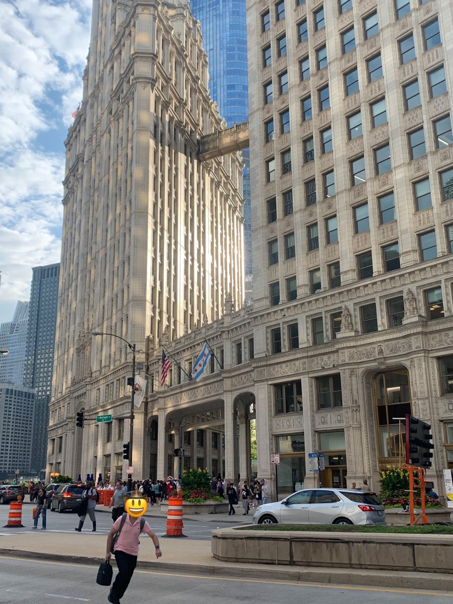 I thought I was taking a photo of some nice lighting on the Wrigley building. Instead I was taking a photo of a desperate commuter running to catch his bus. (He made it.)